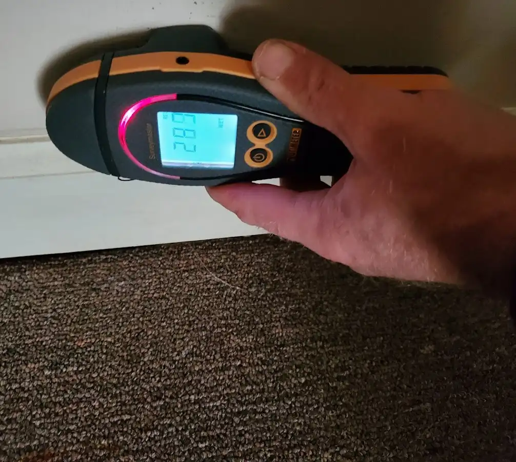 Moisture detection at baseboard during Sewage Cleanup & Sanitation in Rincon